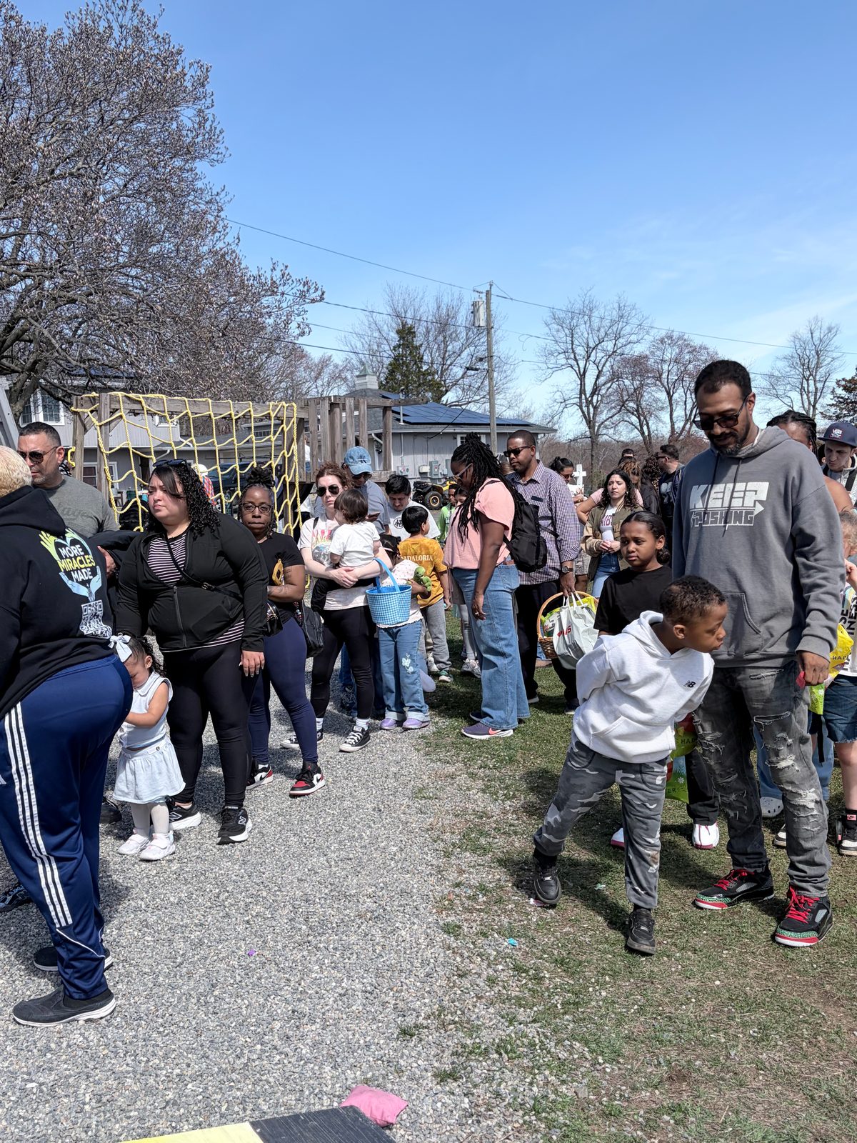 Families and children gathered for the Village Easter egg hunt